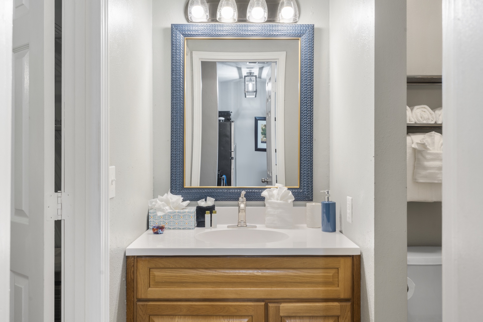 A single vanity & shower/tub combo await in this ensuite bath