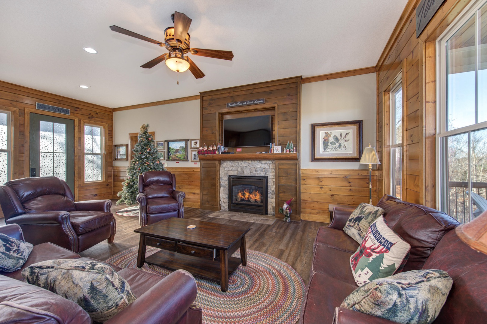 Relax in the upper-level living room & savor a movie by the inviting fireplace