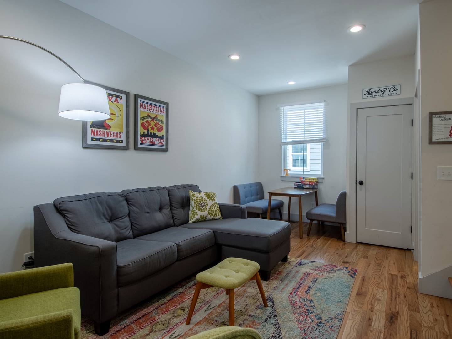 Mid level living are with ample seating, TV, and board games (2nd floor)
