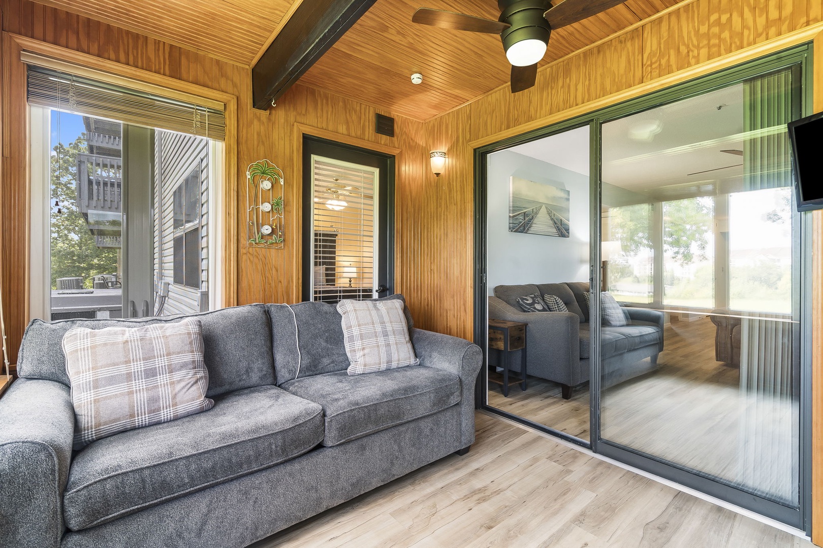 Head into the sunroom & relax with tranquil nature views on the queen sleeper sofa