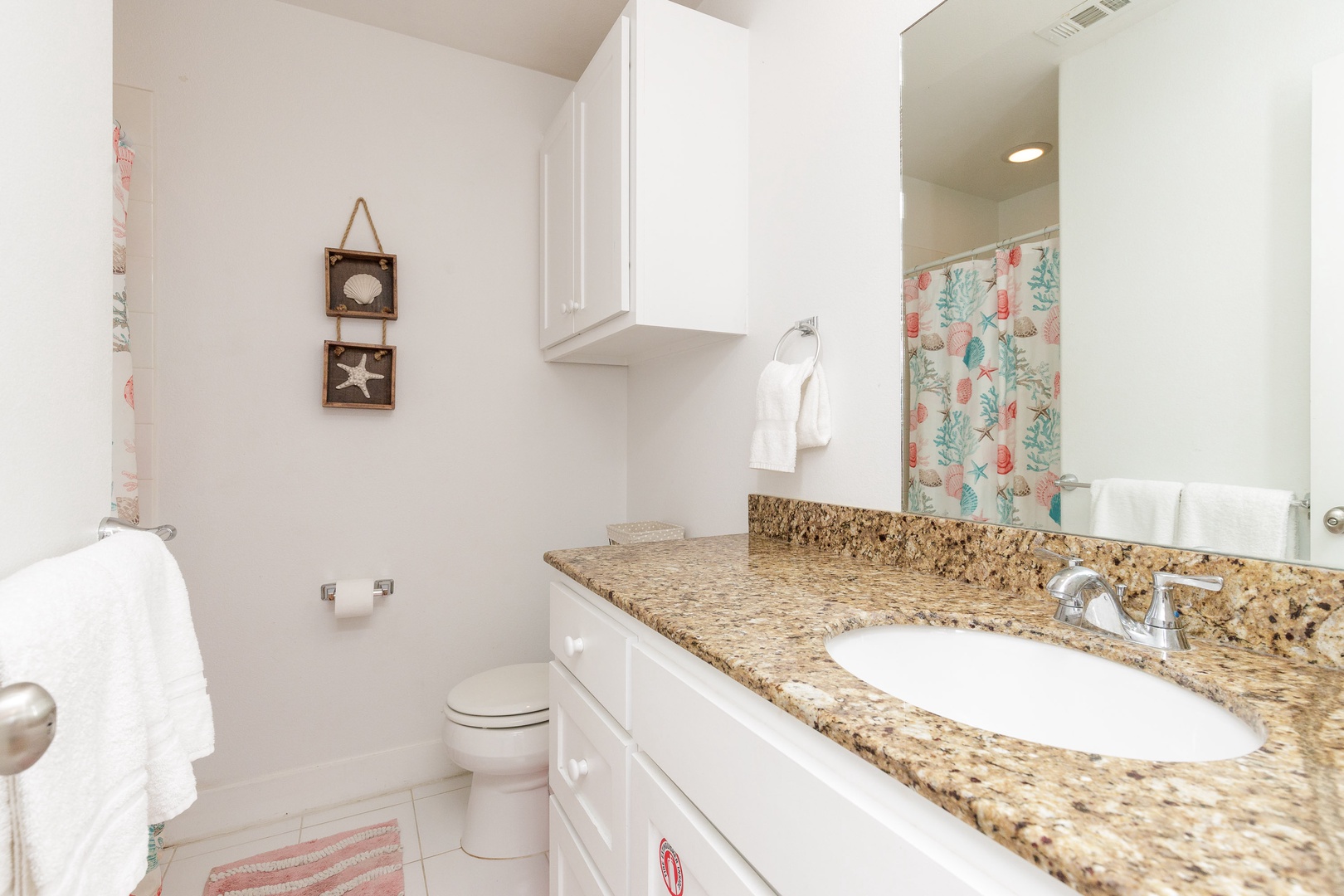 The common 2nd floor full bath includes a single vanity & walk-in shower