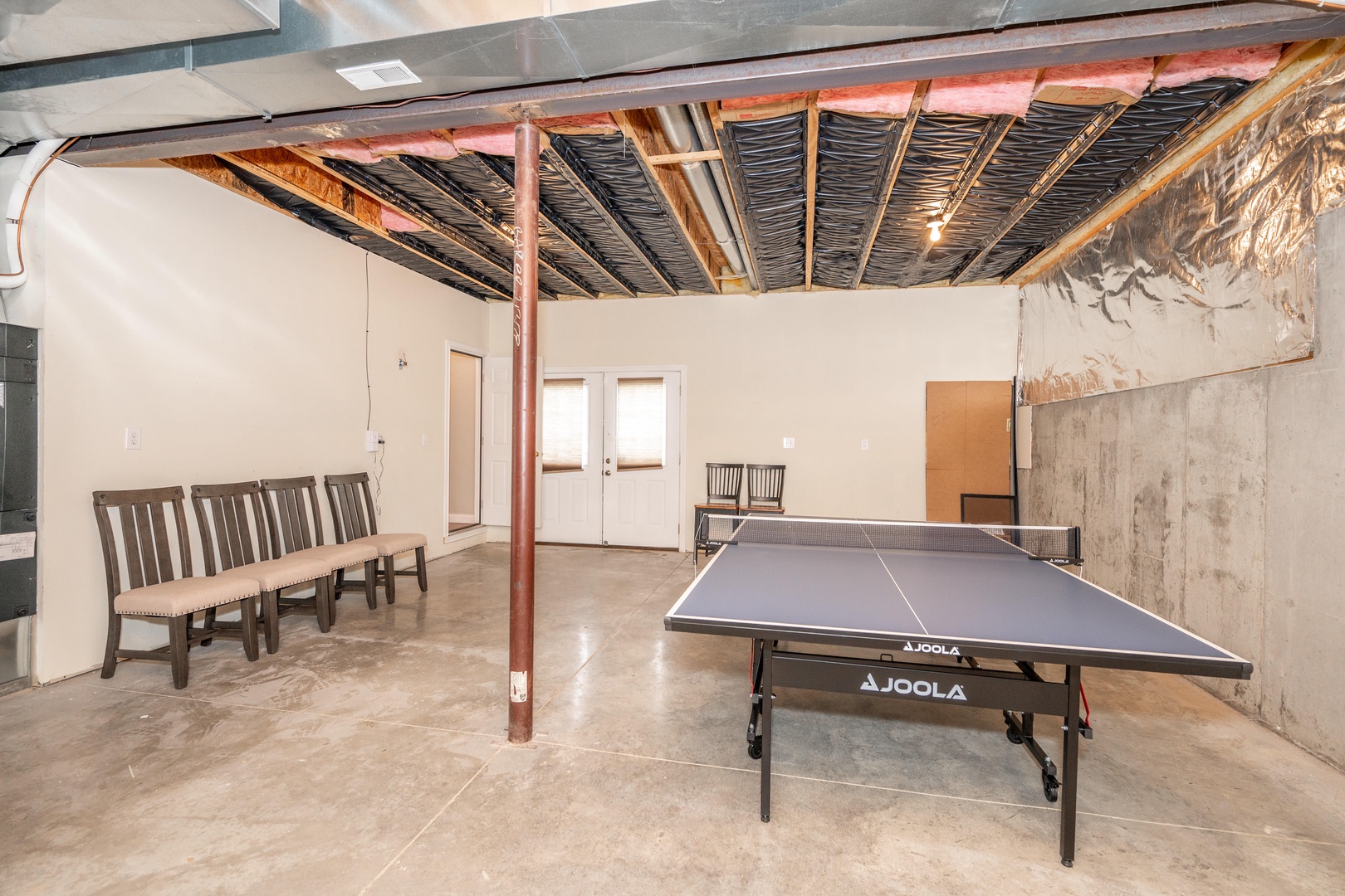 Basement game room with ping pong table
