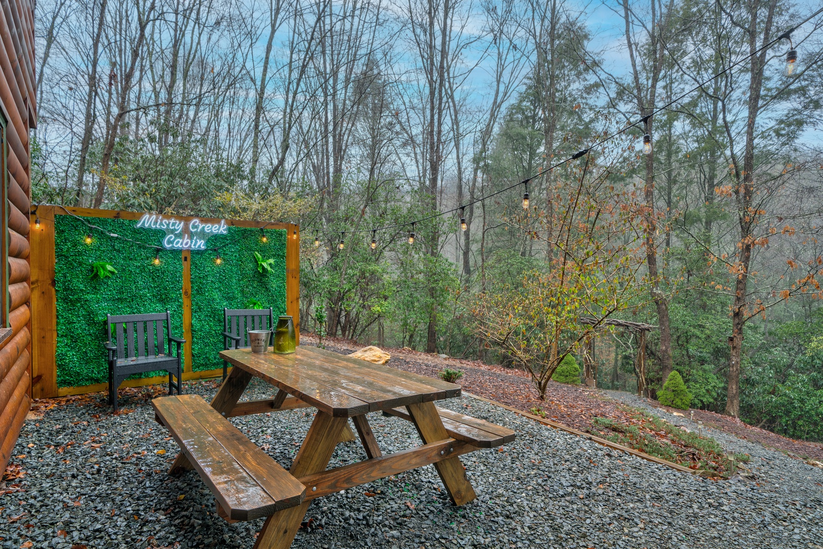 Picnic table area has a view of path to creek