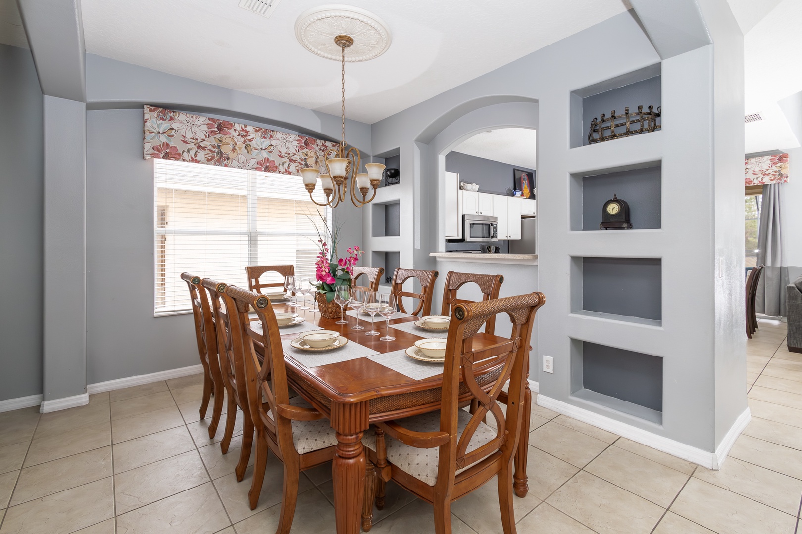 Gather for meals together at the elegant dining table, seating 8