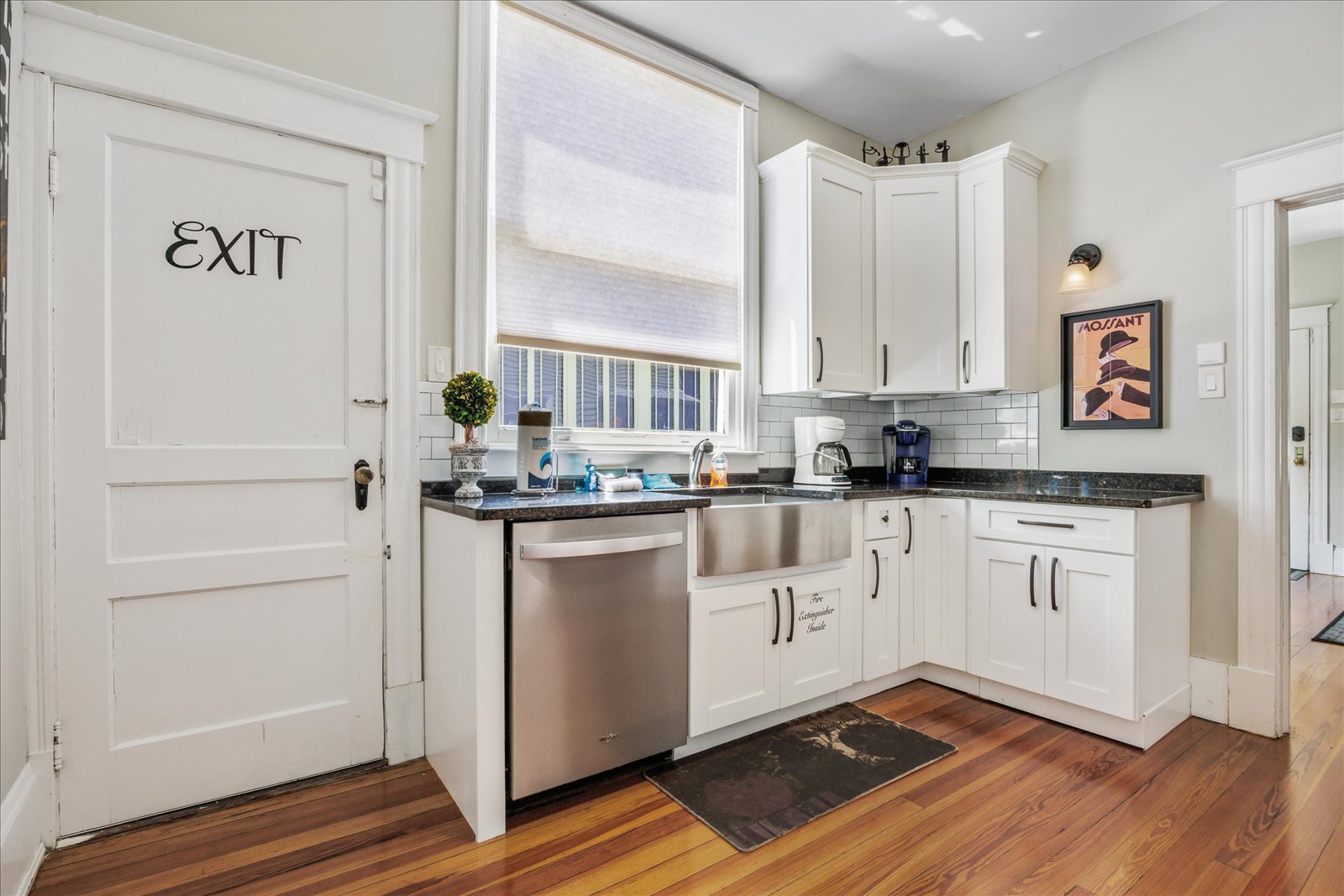 Unit B – The quaint kitchen offers ample space & all the comforts of home