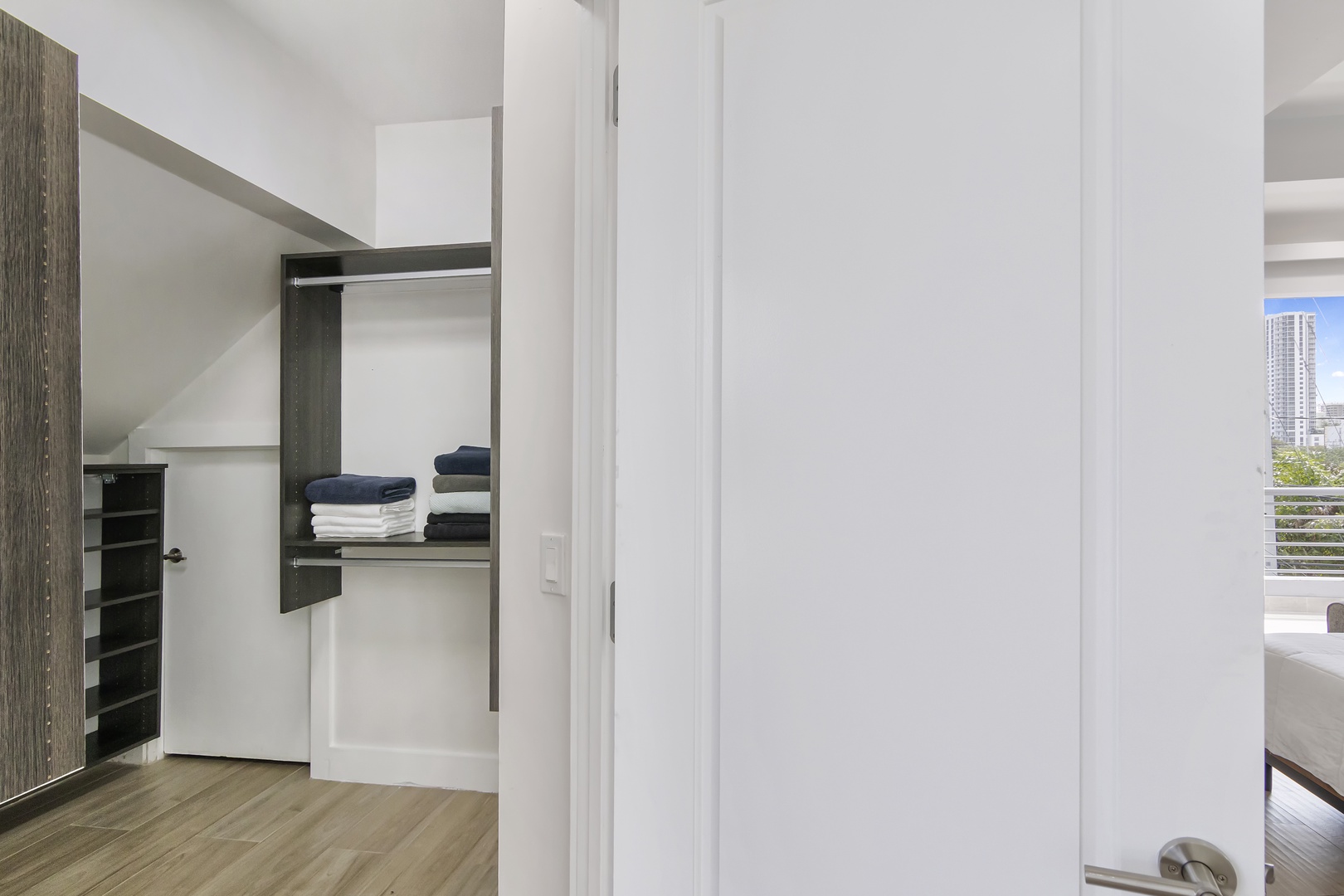 Keep clothes & bags neatly tucked away in the 3rd-floor walk-in closet