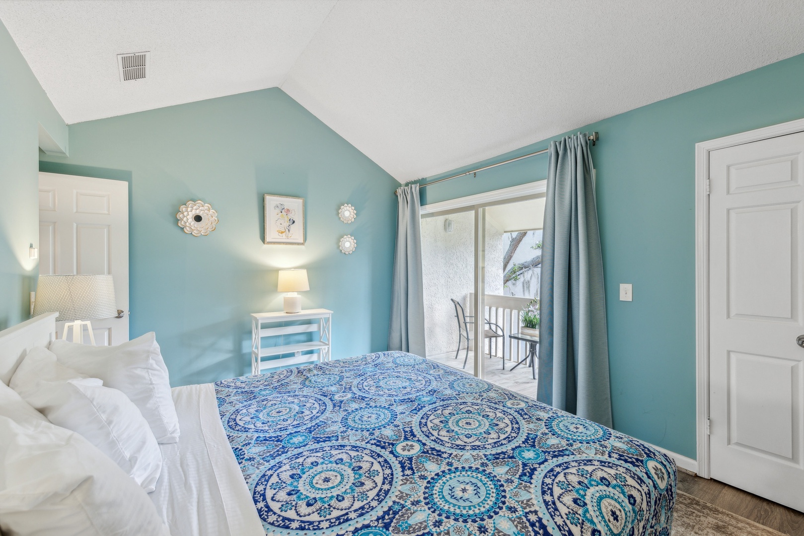 There serene king suite boasts a balcony, king bed, Smart TV & private ensuite