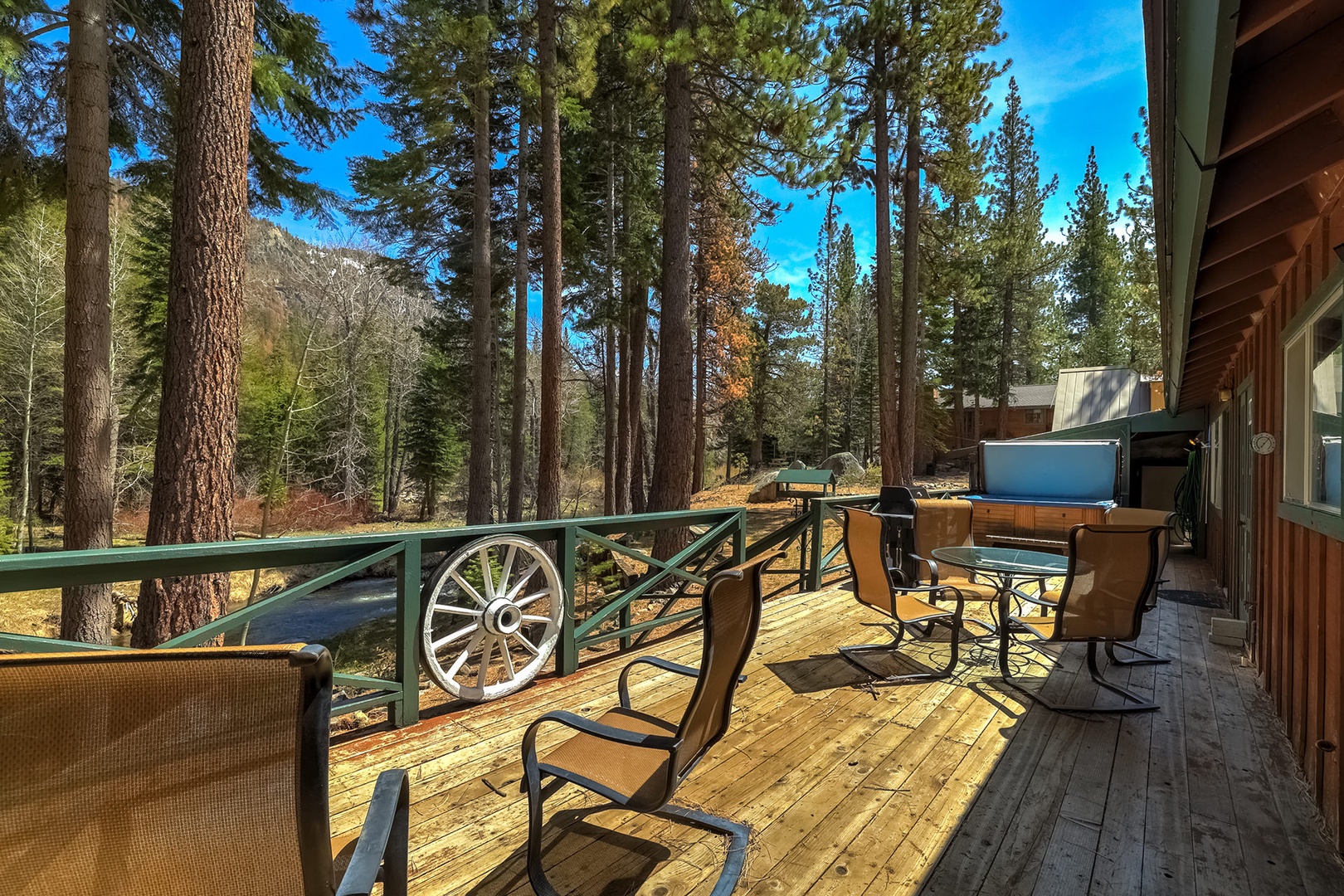 Back deck with hot tub and grill