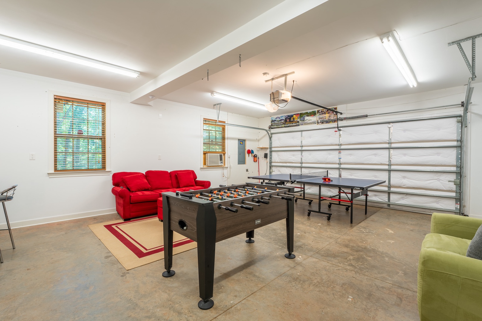 Garage - game room with TV, foosball, and table tennis