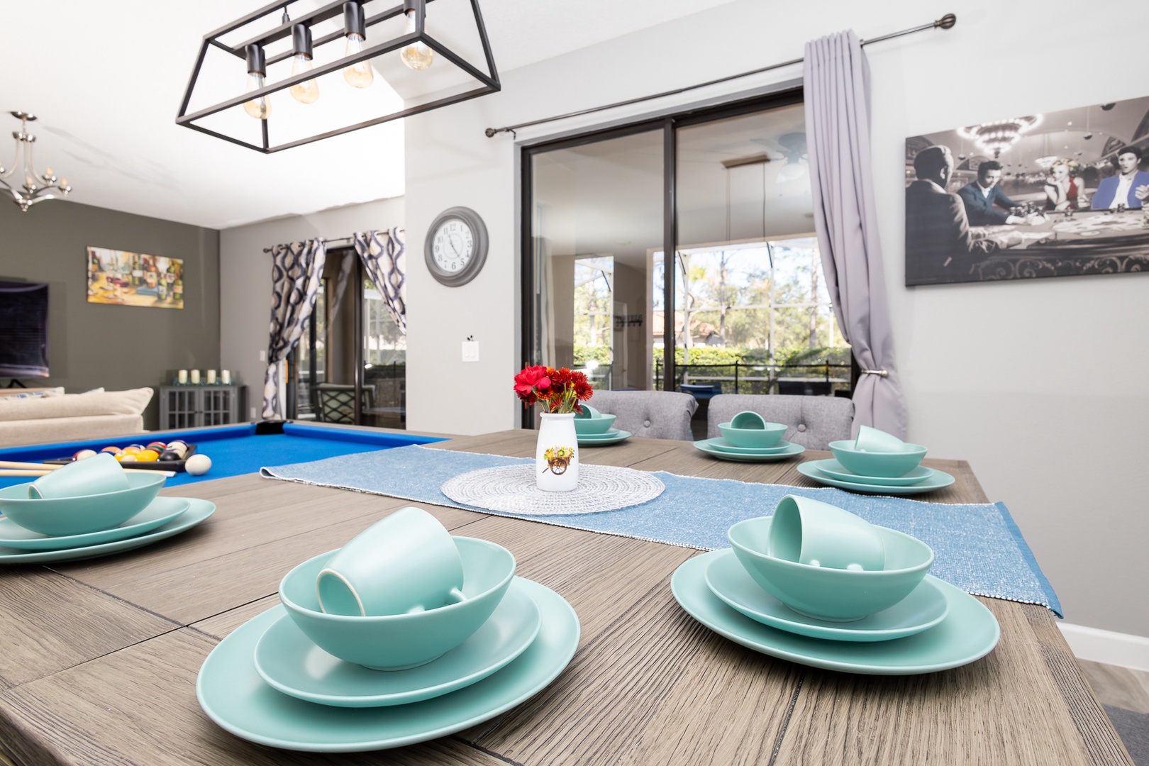 Gather for meals together at the elegant dining table, seating 8