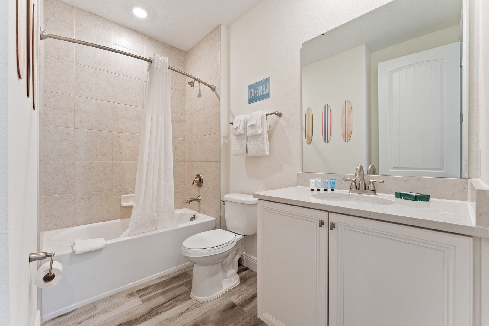 The shared 2nd floor full bath includes a single vanity & shower/tub combo