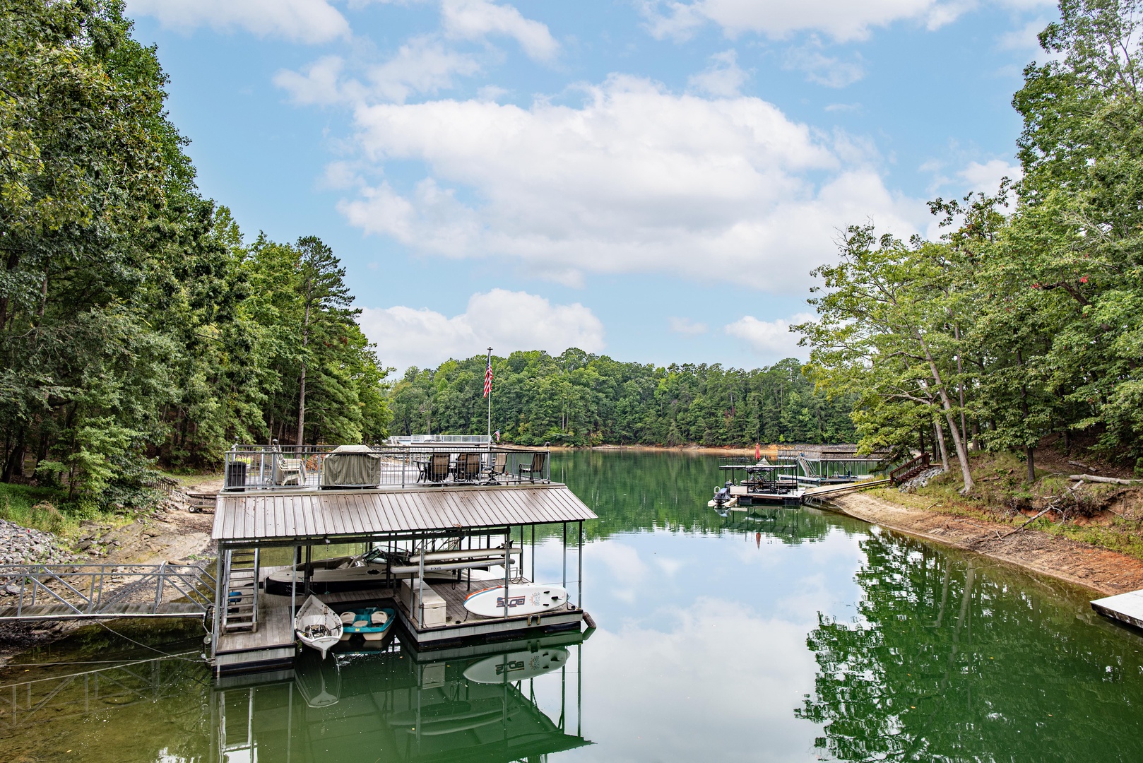 Relax & dine in the sunshine on your very own 2-story dock