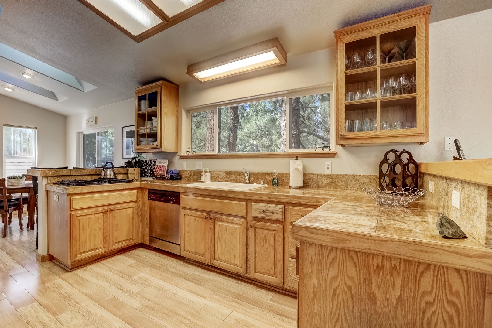 Kitchen with drip coffee maker, toaster oven, blender, waffle maker, slow cooker, and more!