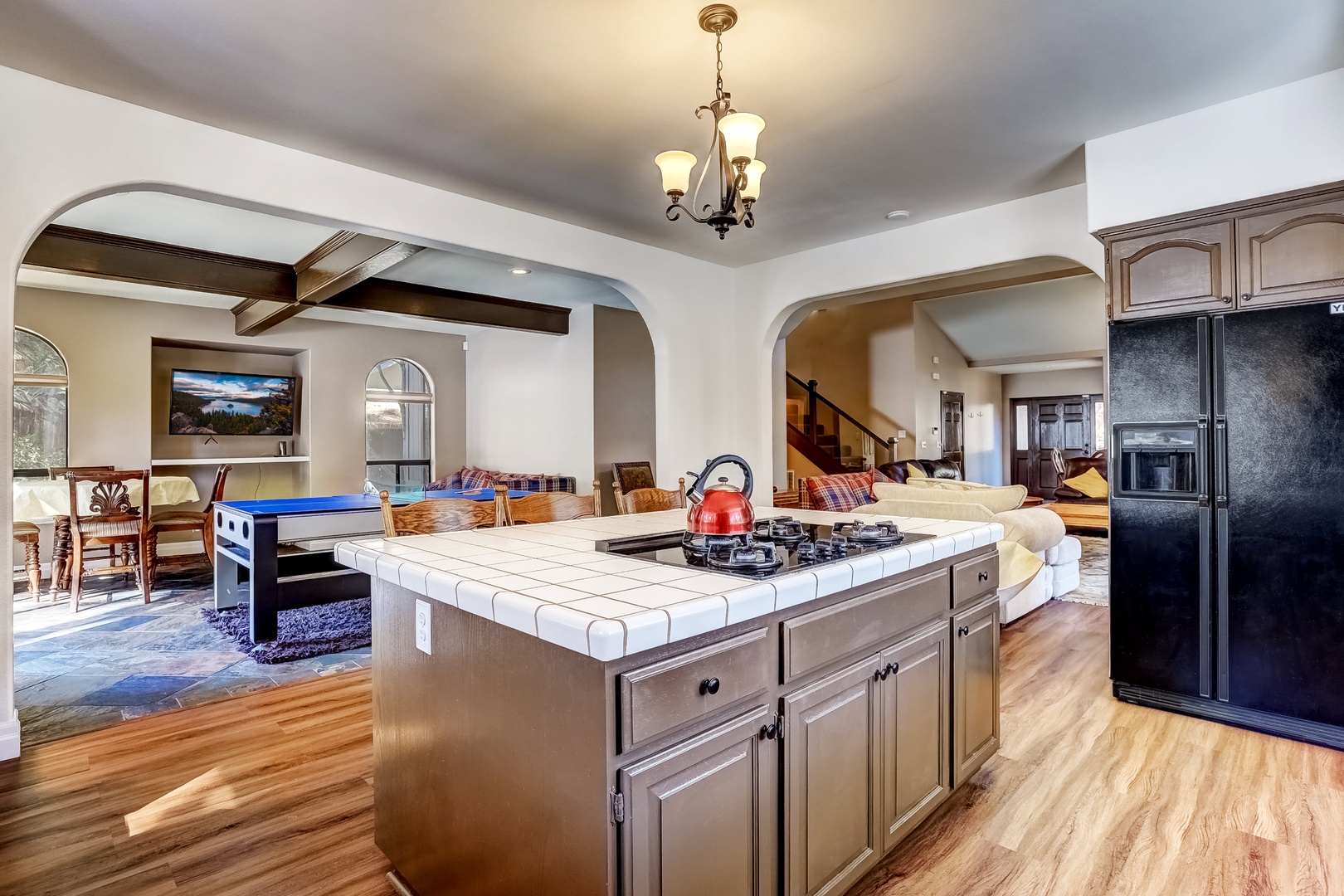 Kitchen with toaster oven, drip coffee pot, waffle maker, dishwasher and more