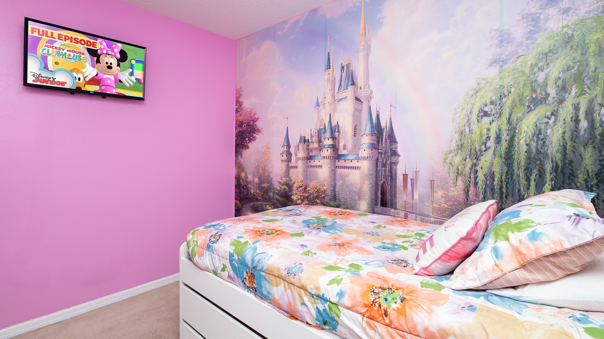 This 2nd floor princess-themed bedroom has a twin-over-full bunk bed & an additional twin bed