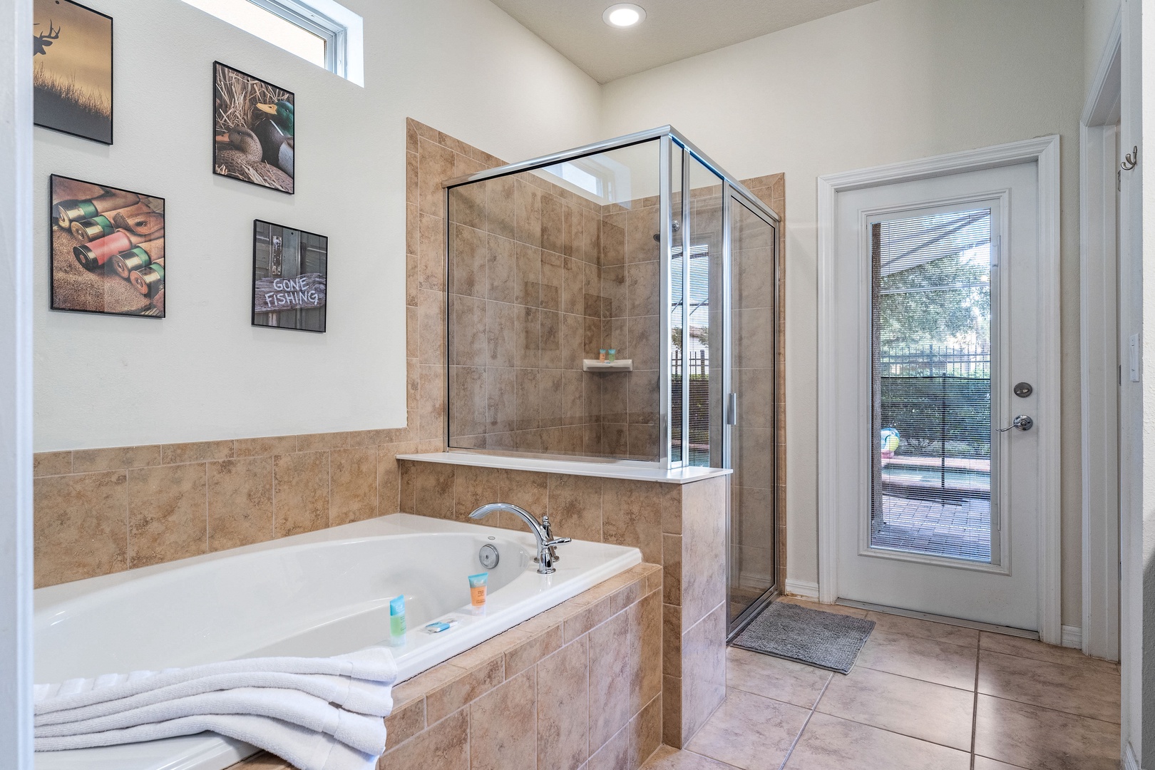 Ensuite bathroom with separate shower and soaking tub