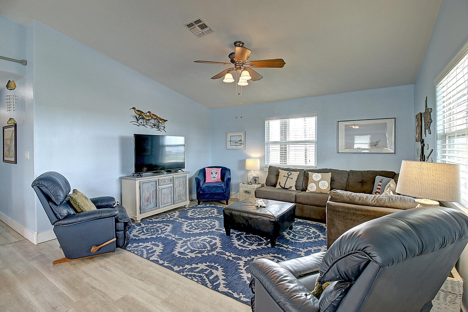 Bright open living space with ample seating, and Smart TV