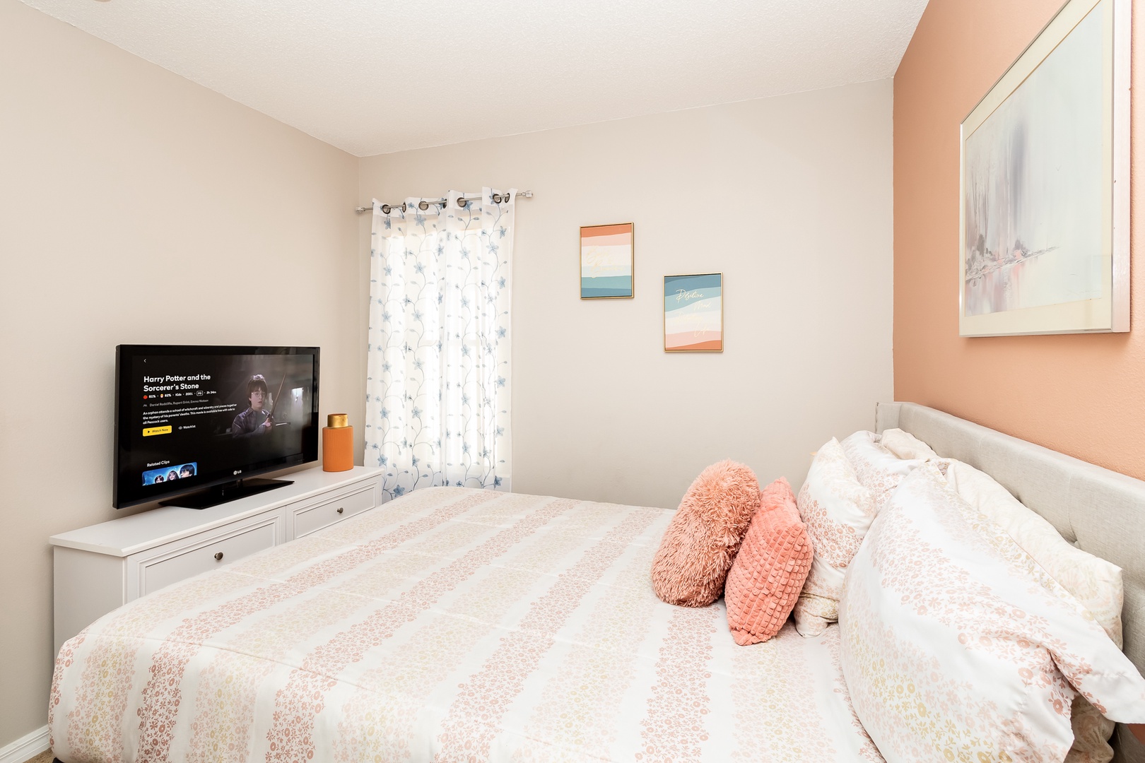 Enjoy the fourth bedroom’s cozy queen bed & smart TV on quiet afternoons