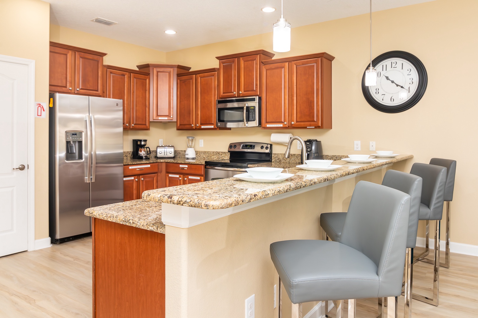 Sip morning coffee or grab a bite at the kitchen counter, with space for 4