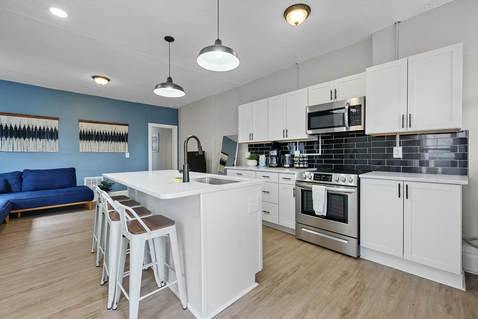 Prepare culinary masterpieces in Apartment 1166.5’s stylish open kitchen