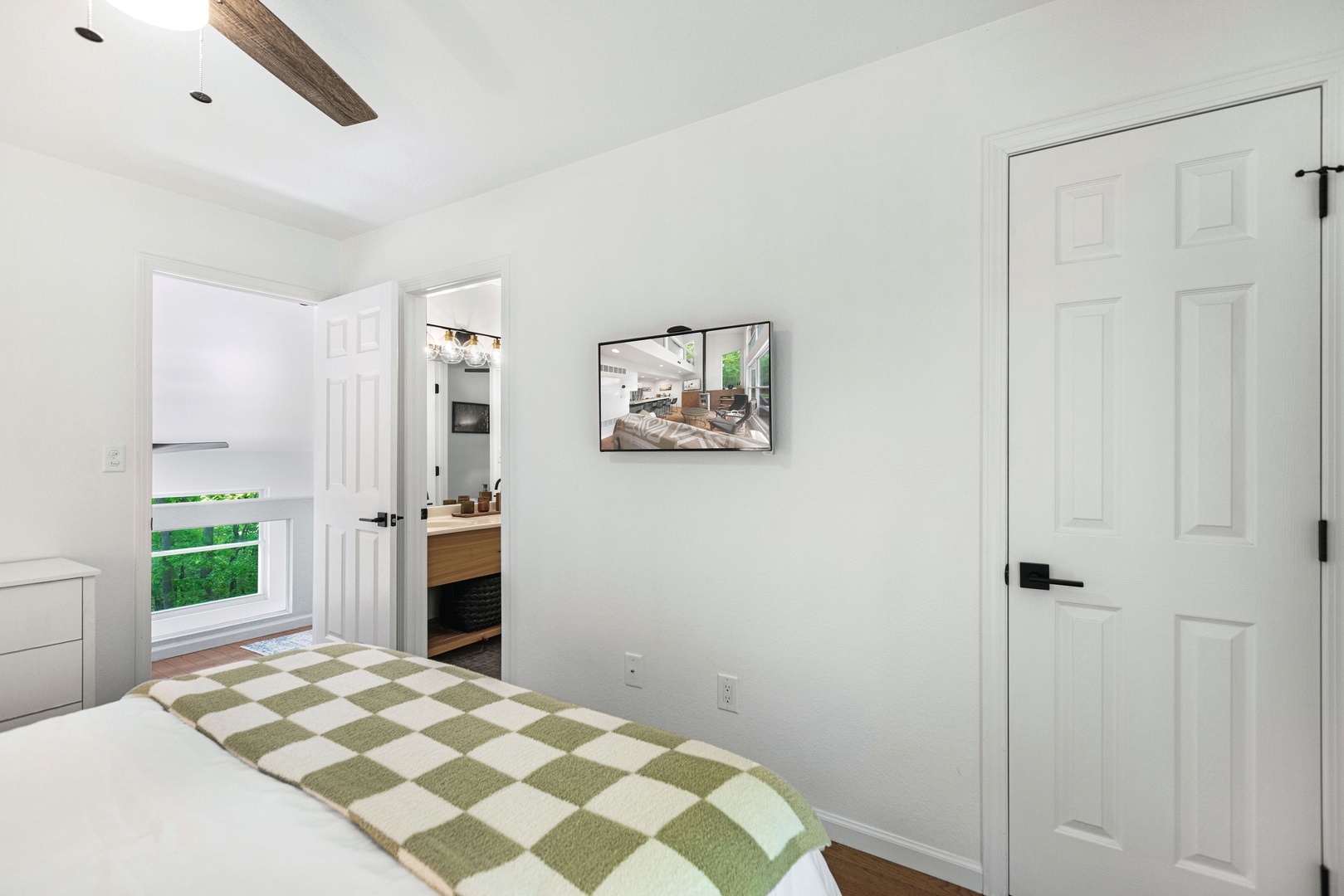 The 1st of 2 second-floor queen suites off the Jack & Jill bath, with Smart TV