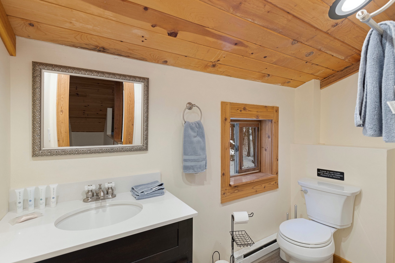 The upper-level ensuite includes a single vanity & shower