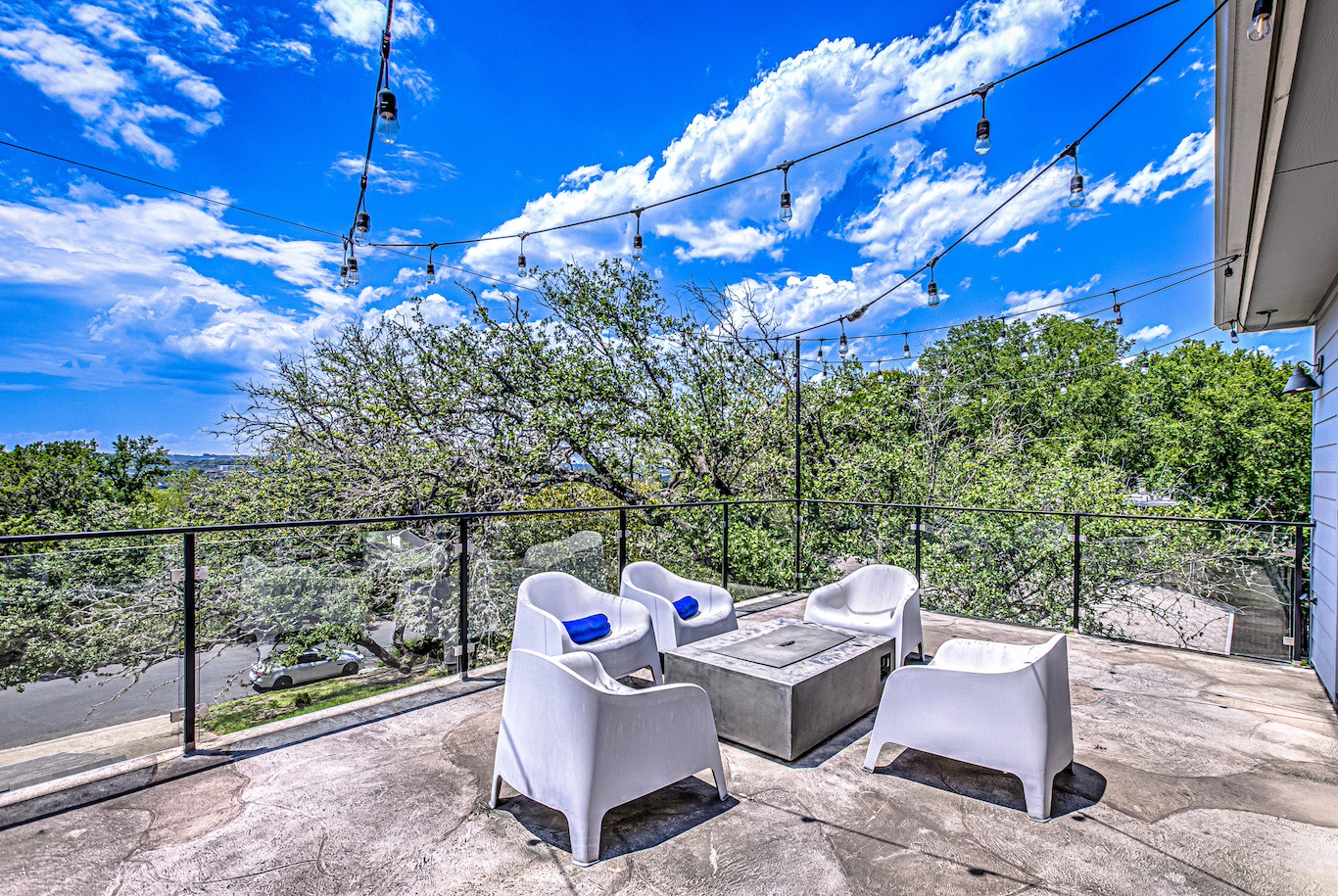 Lounge the day away with a view around the firepit on the balcony!