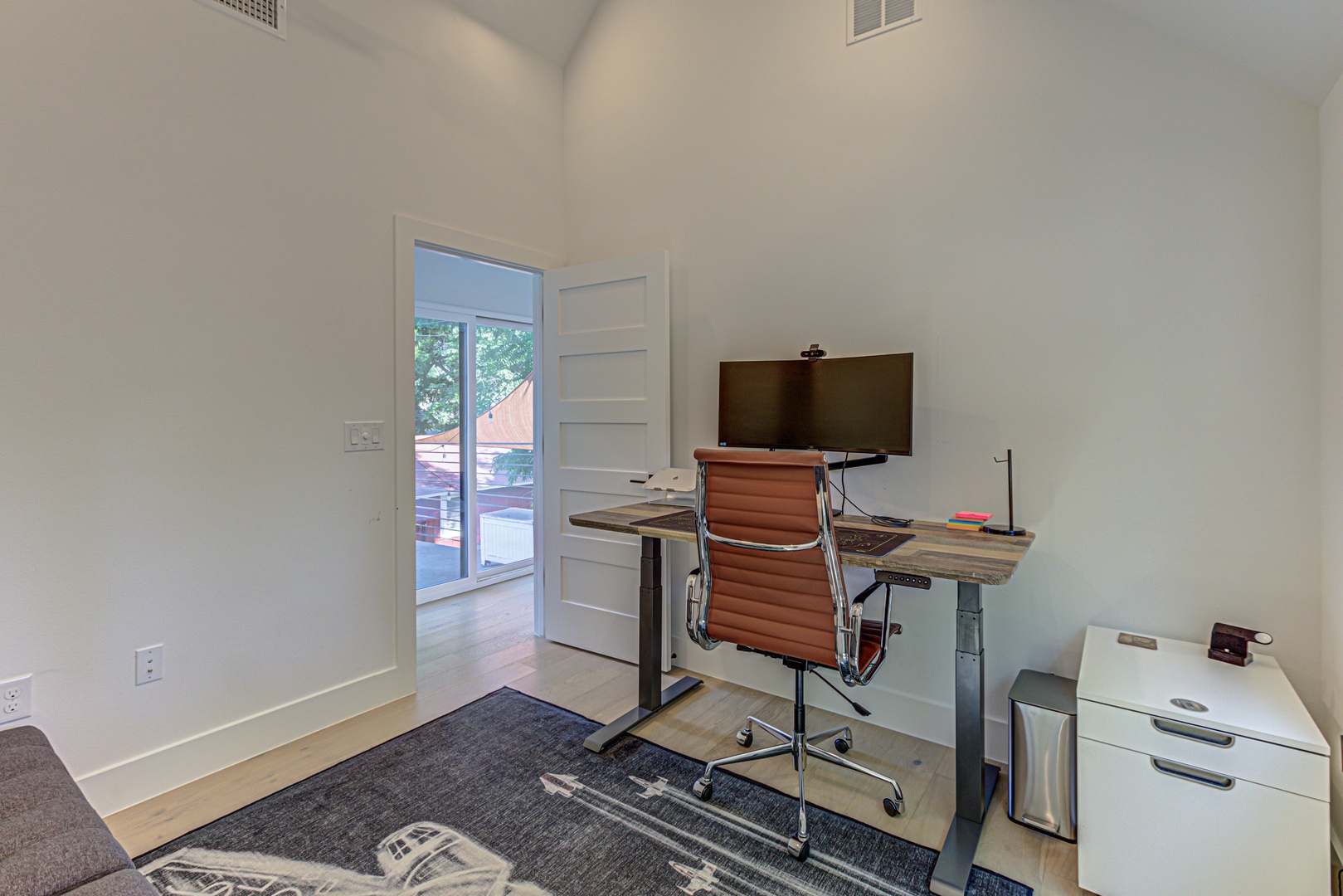 Bedroom 1 with full futon, and work station