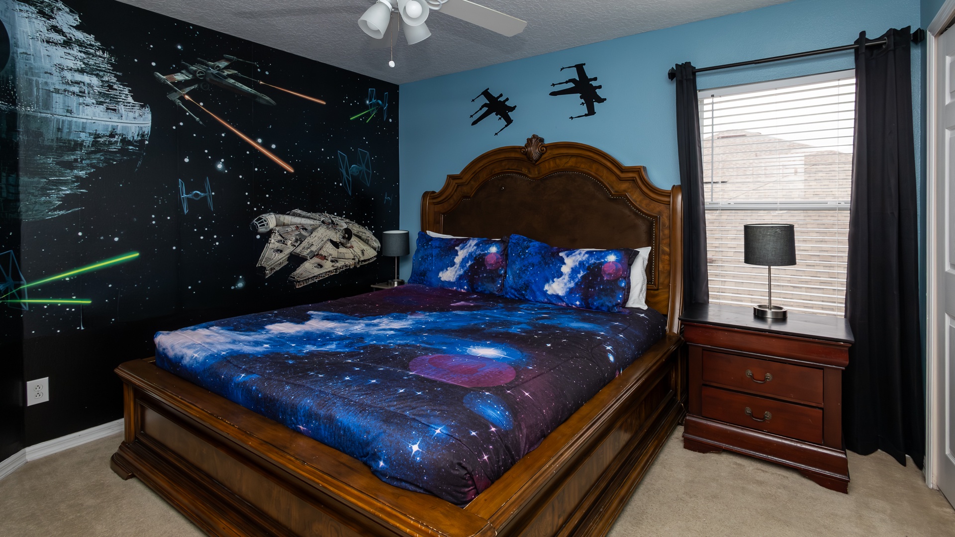 Second-floor Star Wars-themed king bedroom—galactic comfort awaits