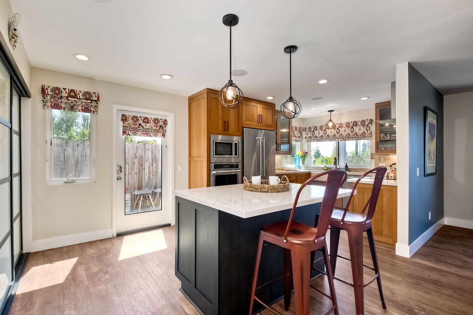 Sip morning coffee or grab a bite at the kitchen island, with seating for 2