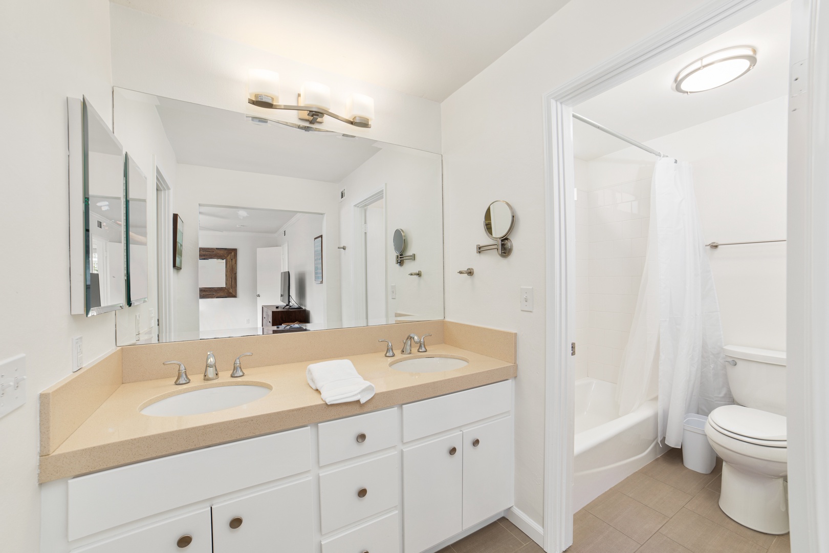 Wash up in this ensuite, including a double vanity & shower/tub combo