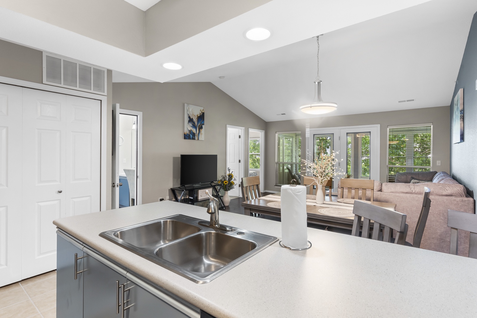 The serene open kitchen offers ample space & all the comforts of home