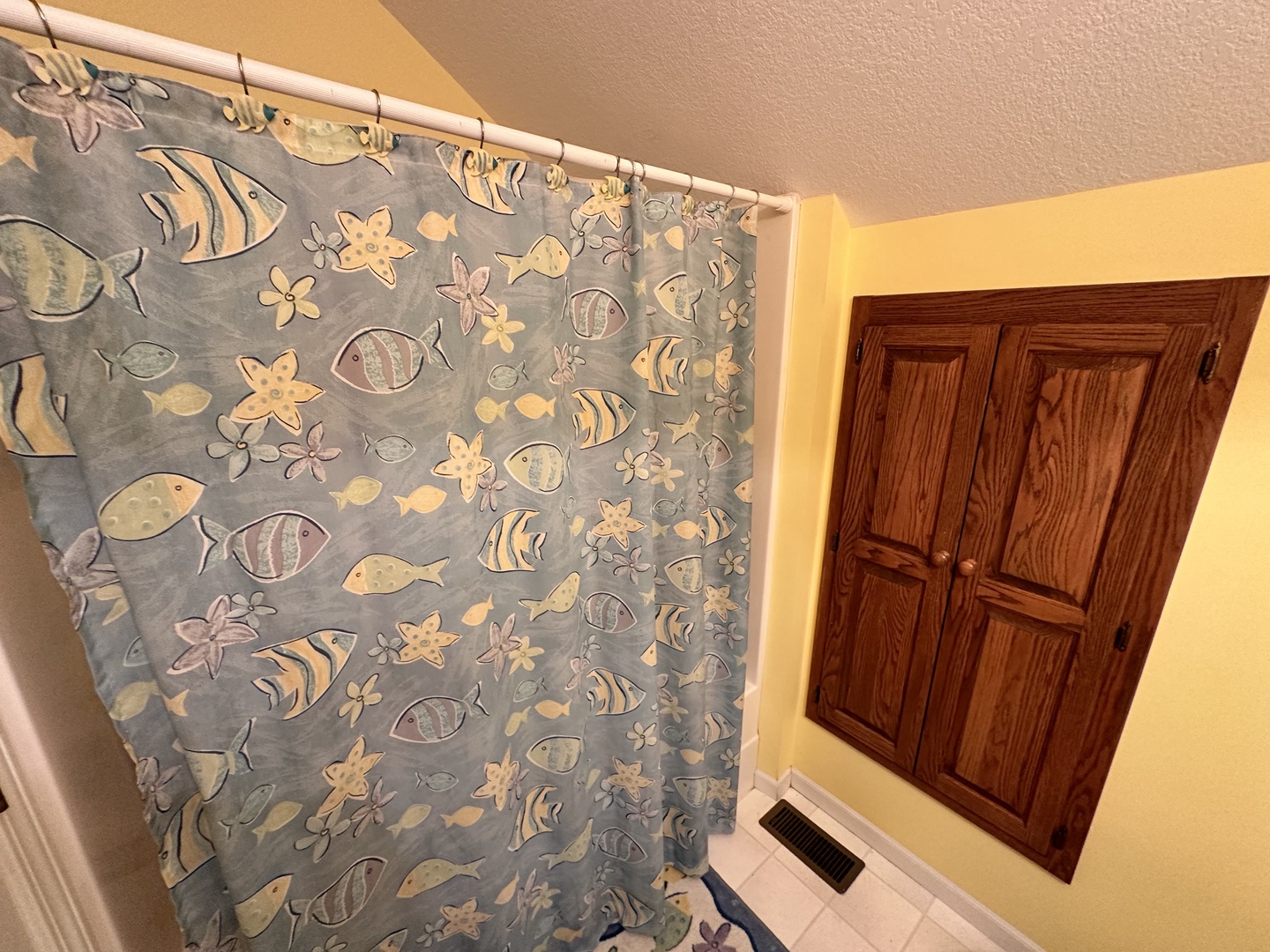 Shared bathroom with shower/tub combo