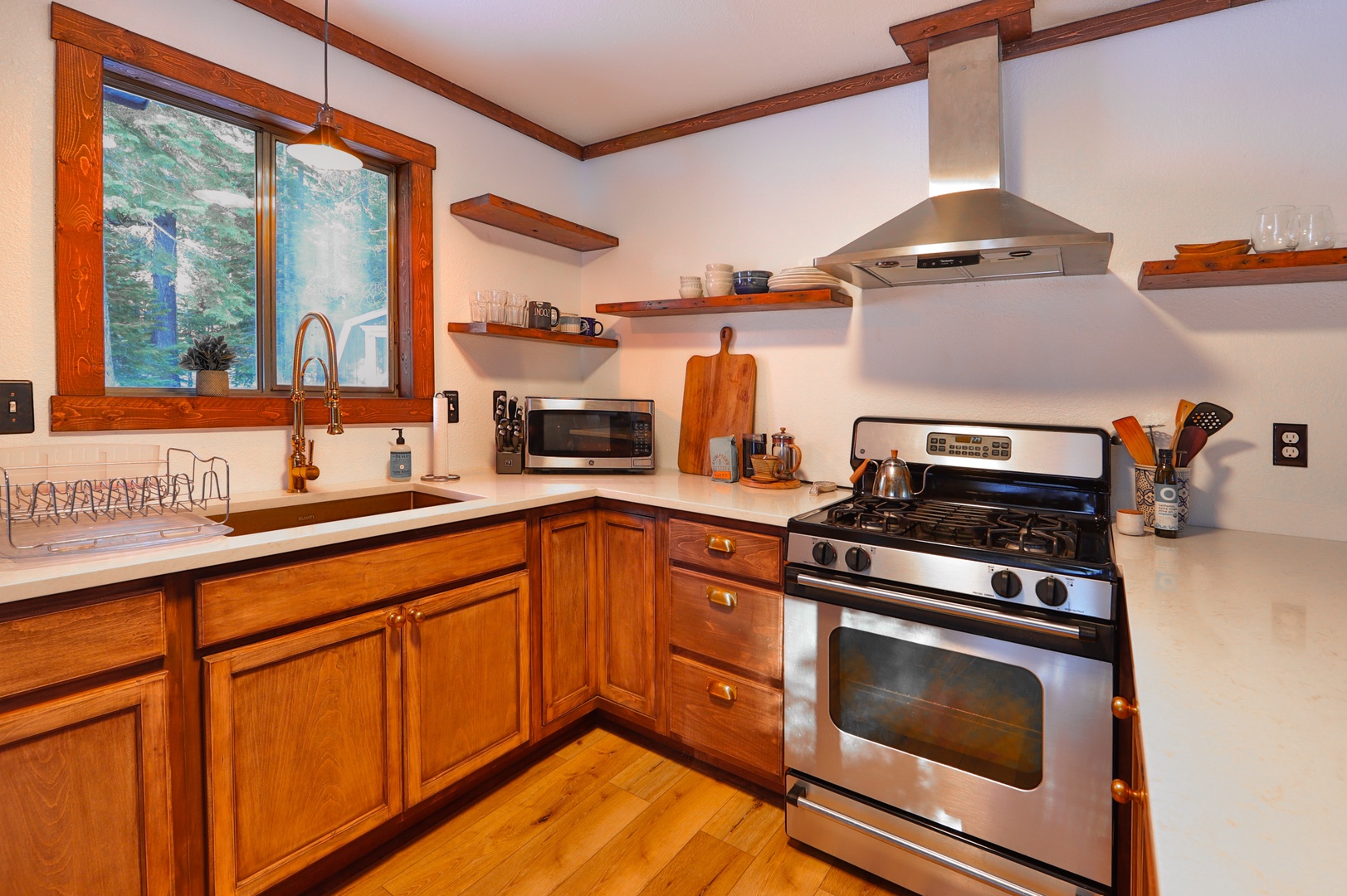 The open, airy kitchen offers ample space & all the comforts of home