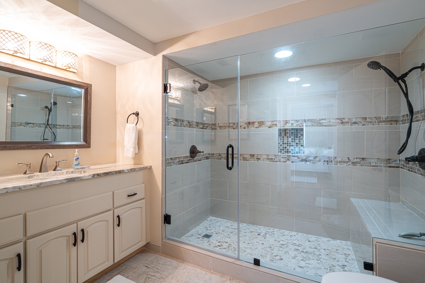The king ensuite features dual vanities & shower with double showerheads