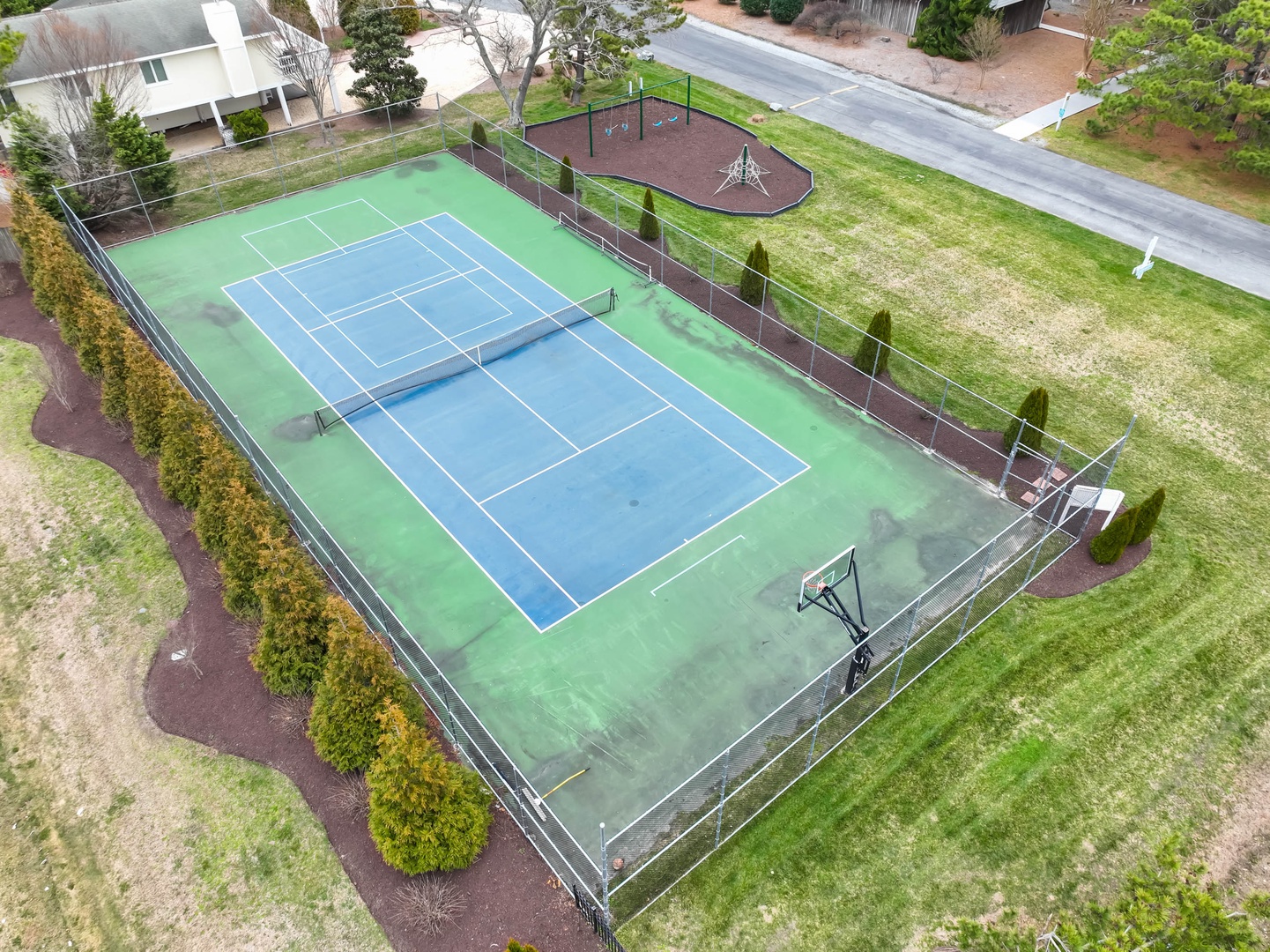 Bust out the rackets and hit the community Tennis Court between beach visits