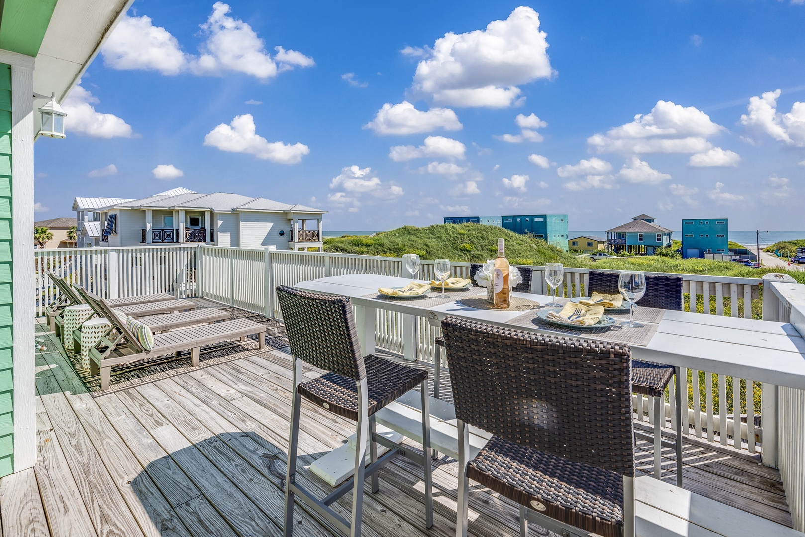 The 3rd Level Deck boasts sweeping area views and plenty of spaces to relax and dine