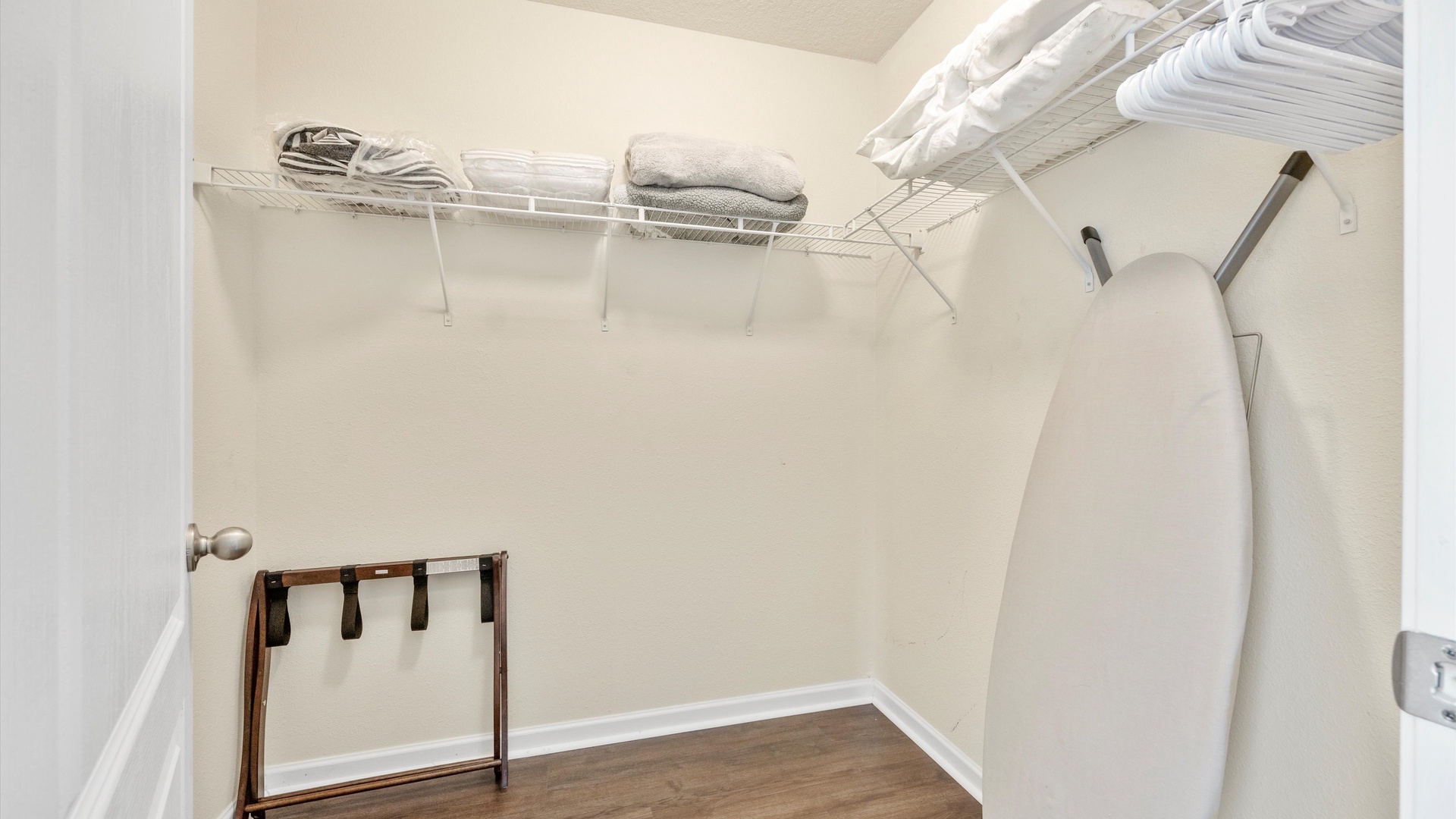 Keep clothes and bags tucked away in the master suite closet