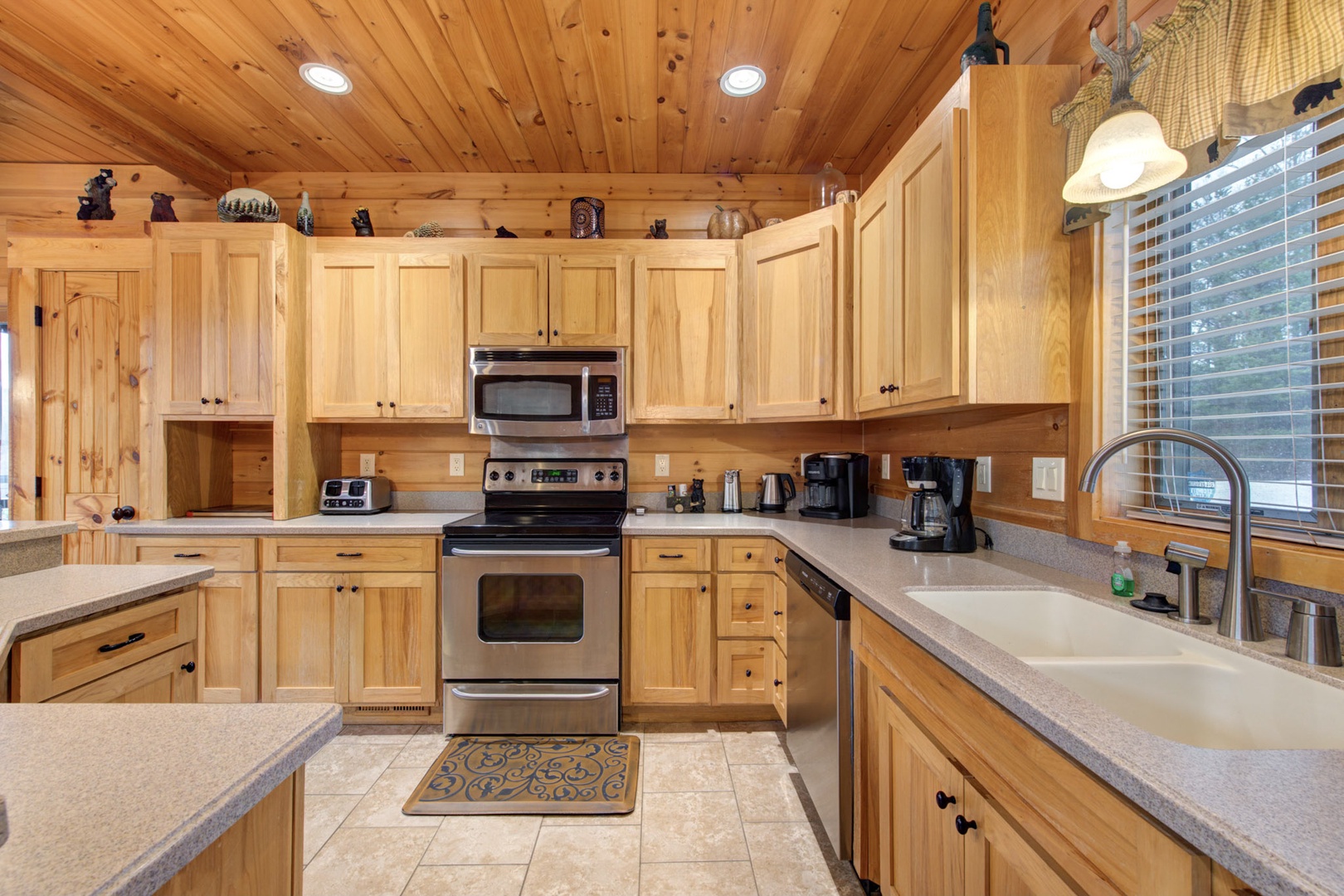 The welcoming kitchen offers ample space & all the comforts of home