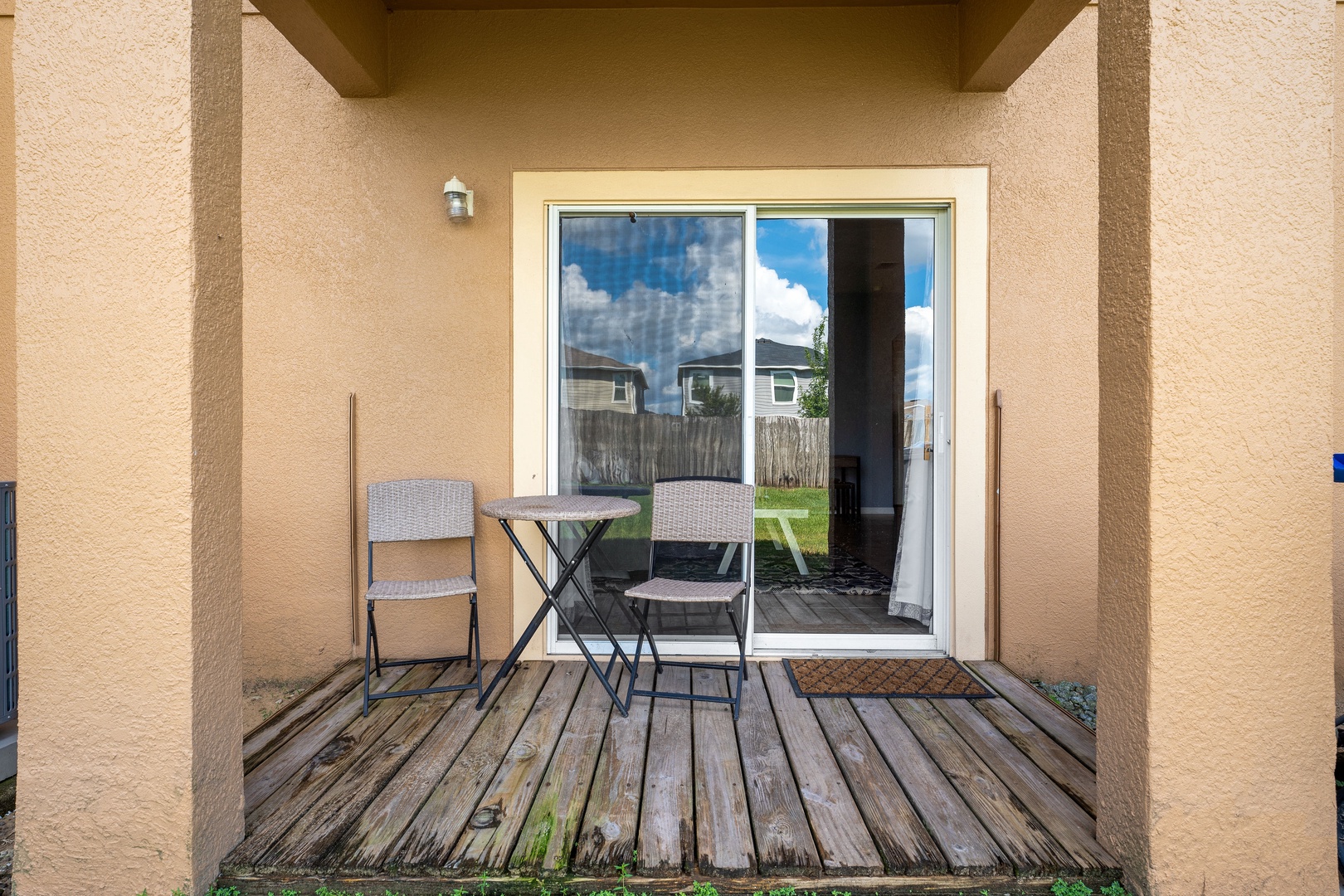 Have your morning cup of coffee on this back patio!