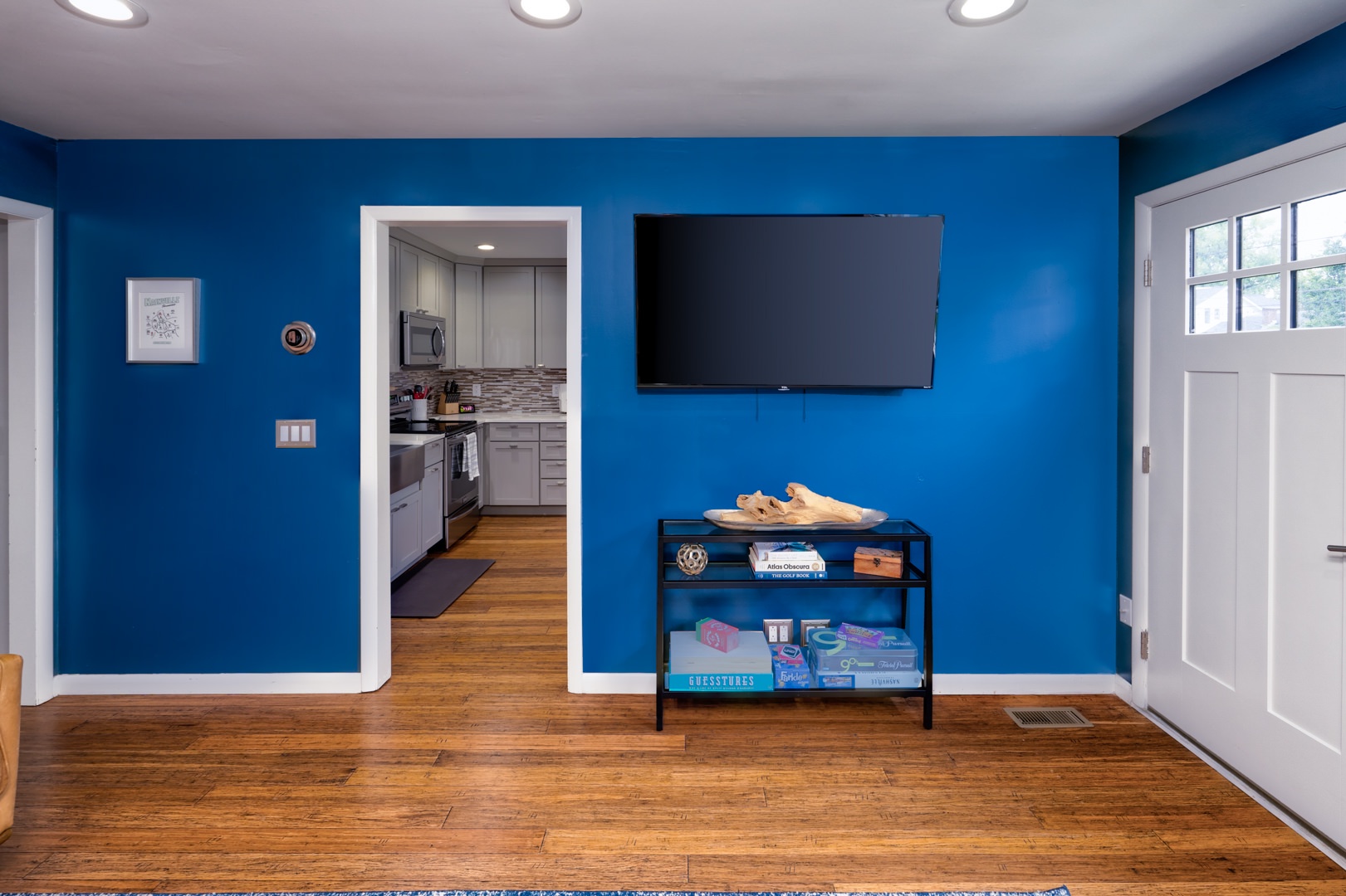 Cozy and spacious living area with TV