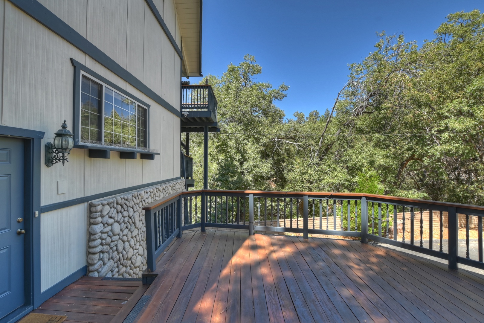 Deck with outdoor seating and grill