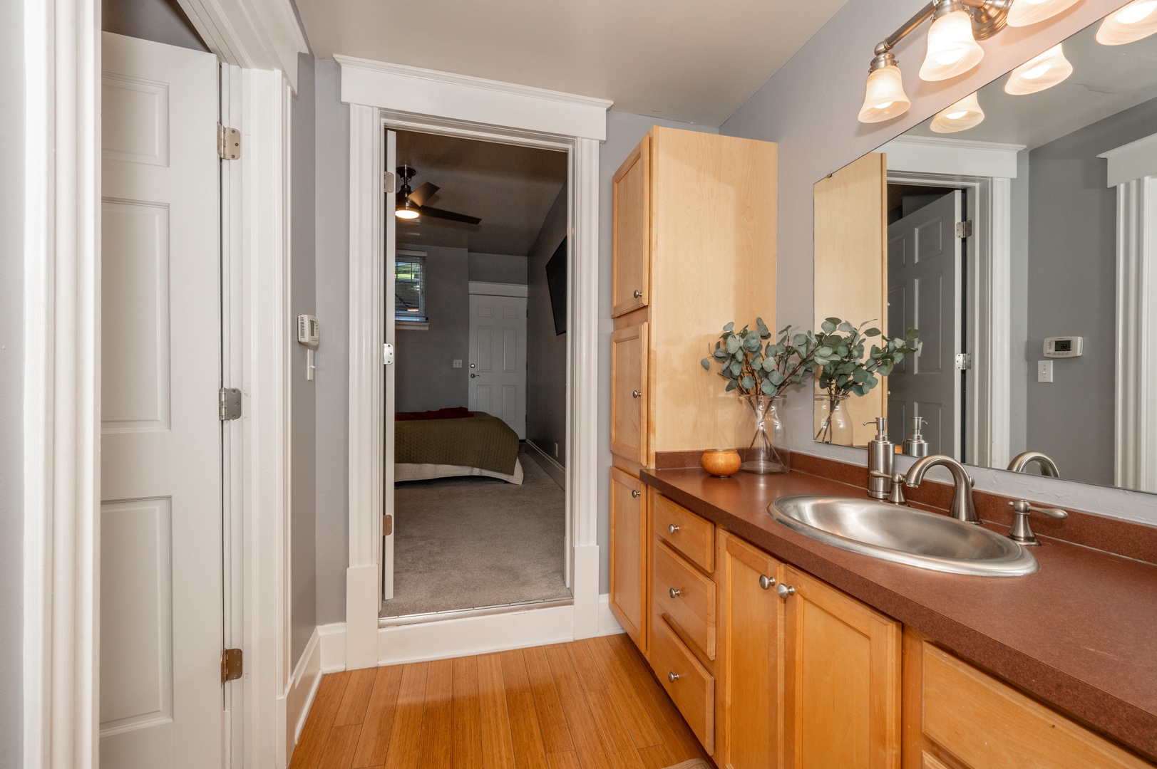 The Bathroom offers warm finishes and a Single Vanity and Shower/Tub Combo