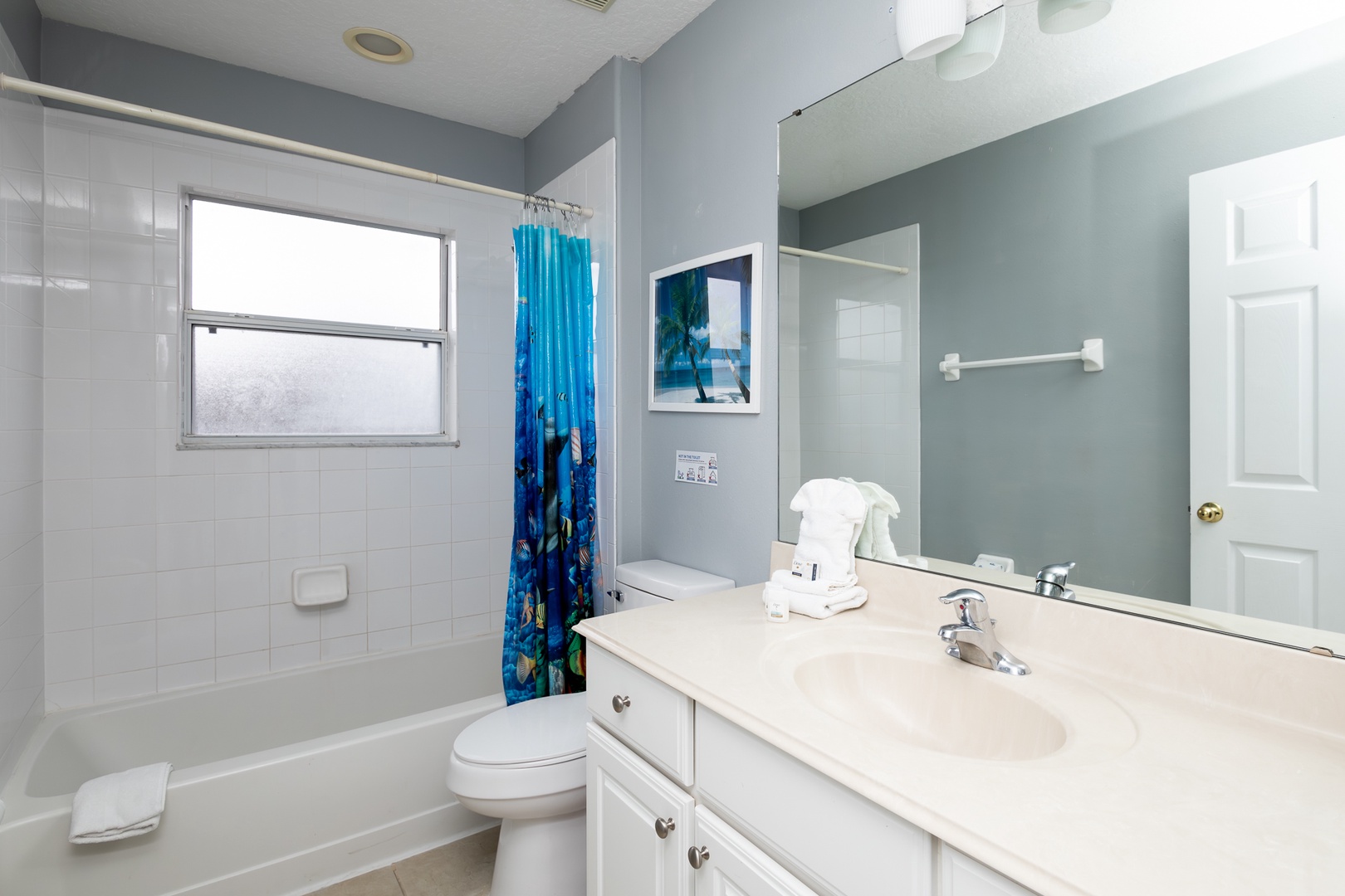 The shared second floor full bath includes a single vanity & shower/tub combo