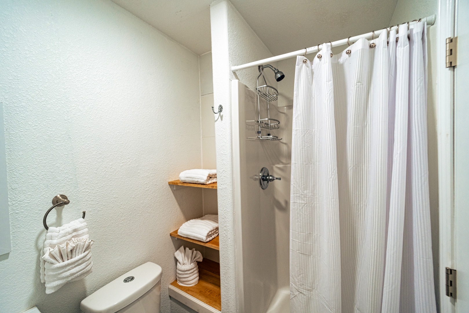 Full bathroom off the office includes a stylish single vanity & walk in shower