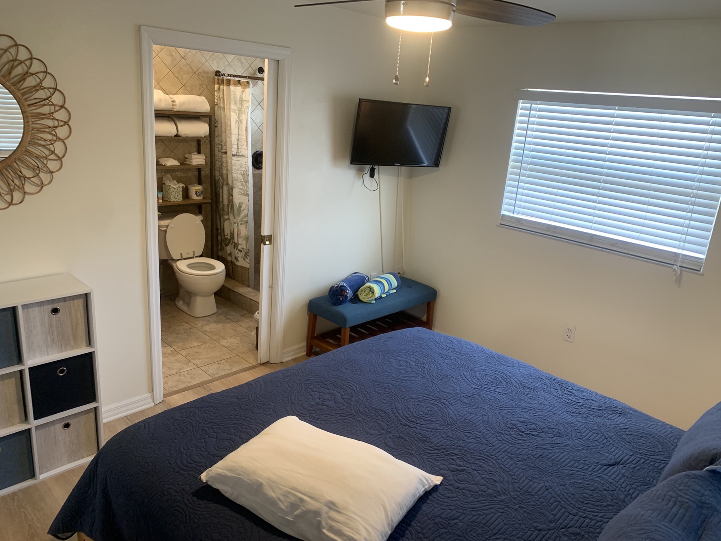 Main bedroom: King bed with TV and en suite bathroom