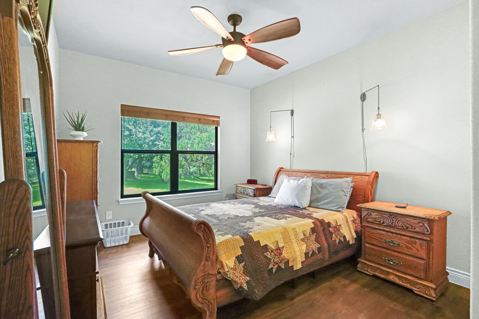 The second bedroom boasts a regal queen bed & smart TV