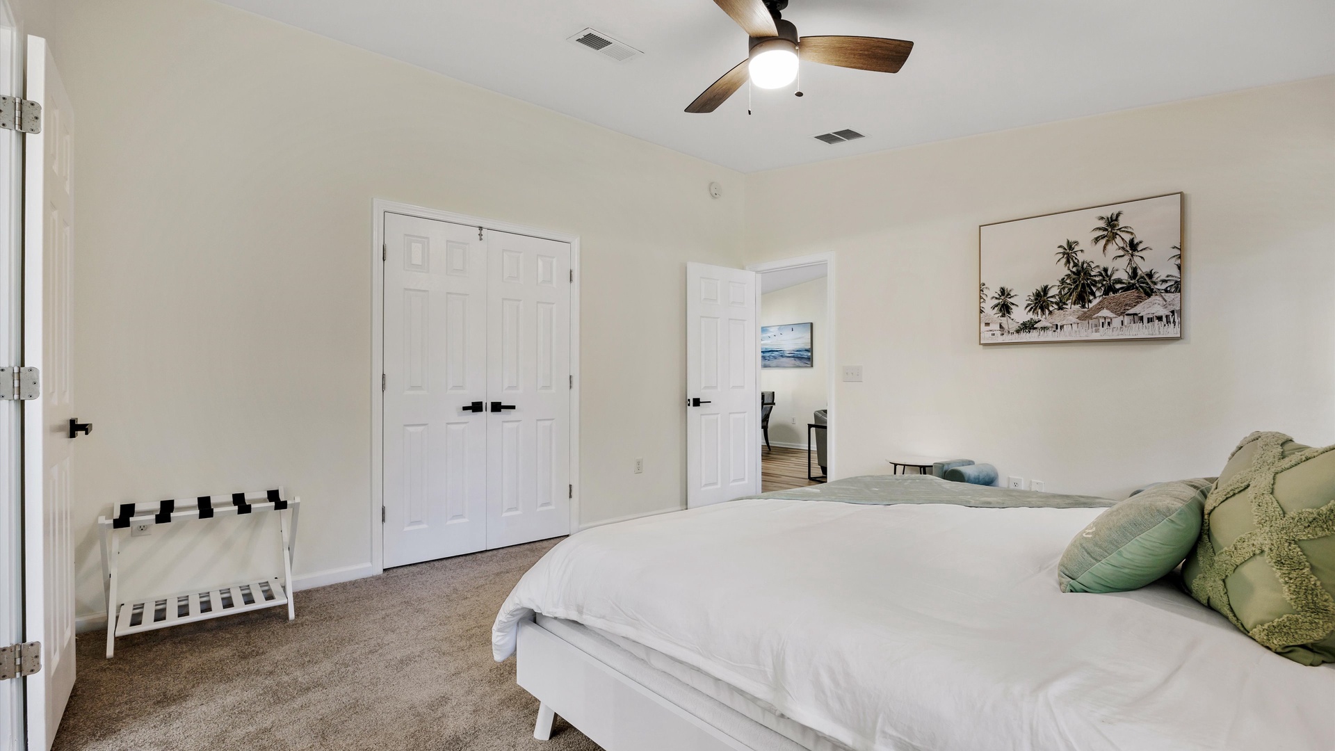 The master suite boasts a king-sized bed & luxurious private ensuite