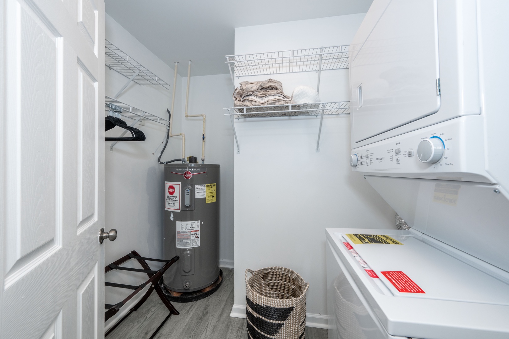 This unit’s cozy king bedroom includes balcony & laundry access