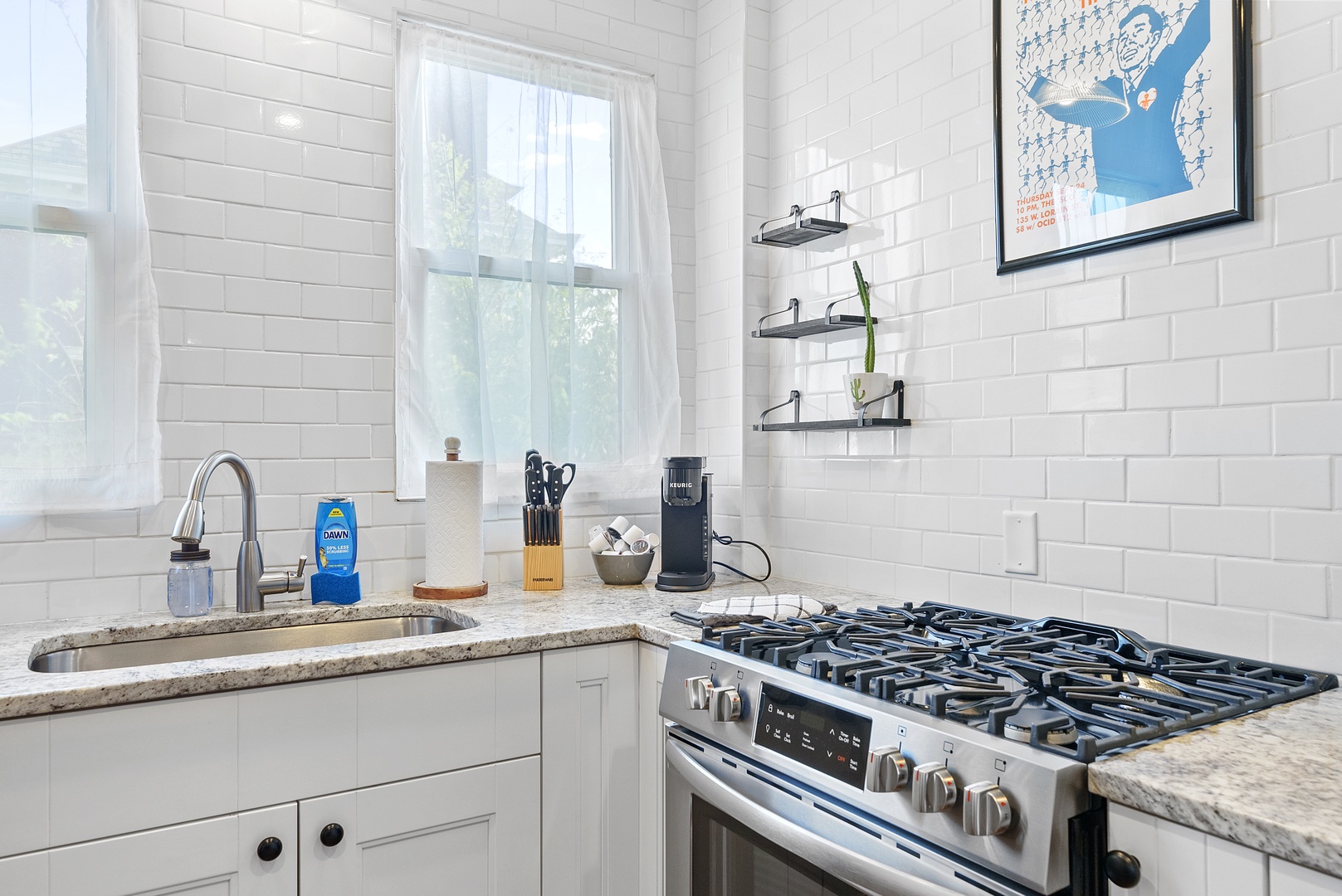 The bright, updated kitchen offers ample space & all the comforts of home